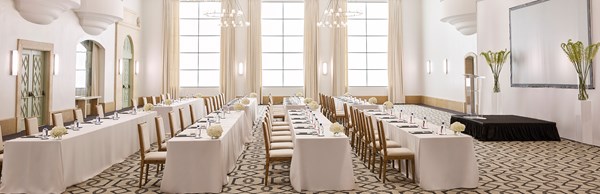 Corporate set up of tables and chairs in the ballroom