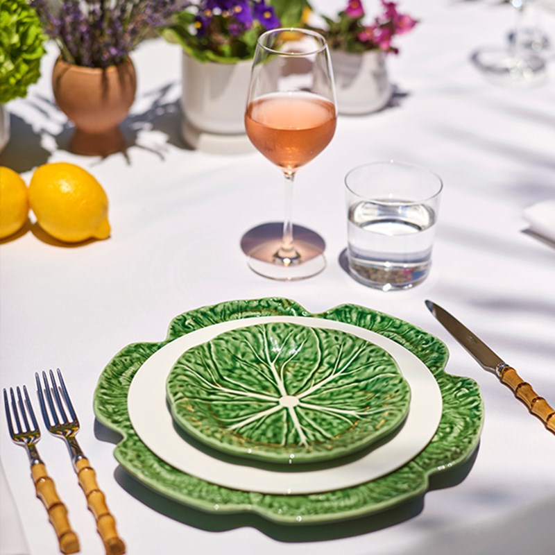 Design tableware on a table in the Garden Terrace at Maybourne Beverly Hills